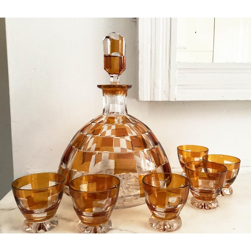 127 - DECANTER AND GLASSES, Art Deco Bohemian decanter and six glasses with amber overlaid glass detail de... 