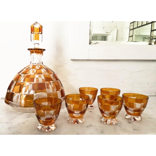 127 - DECANTER AND GLASSES, Art Deco Bohemian decanter and six glasses with amber overlaid glass detail de... 