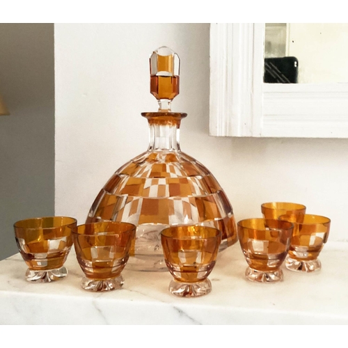 127 - DECANTER AND GLASSES, Art Deco Bohemian decanter and six glasses with amber overlaid glass detail de... 