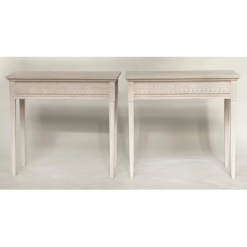 128 - CONSOLE TABLES, a pair, Regency style grey painted each with fluted frieze and square support, 85cm ... 