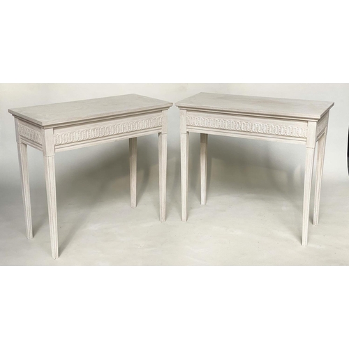 128 - CONSOLE TABLES, a pair, Regency style grey painted each with fluted frieze and square support, 85cm ... 