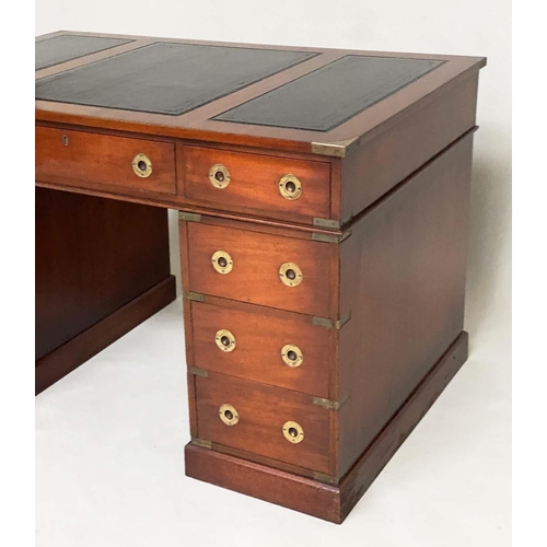 131 - CAMPAIGN STYLE DESK, mahogany and brass bound with leather writing surface and nine drawers, 123cm x... 