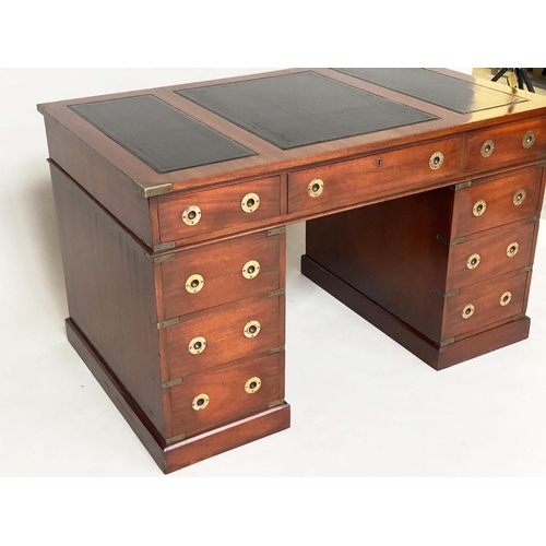 131 - CAMPAIGN STYLE DESK, mahogany and brass bound with leather writing surface and nine drawers, 123cm x... 