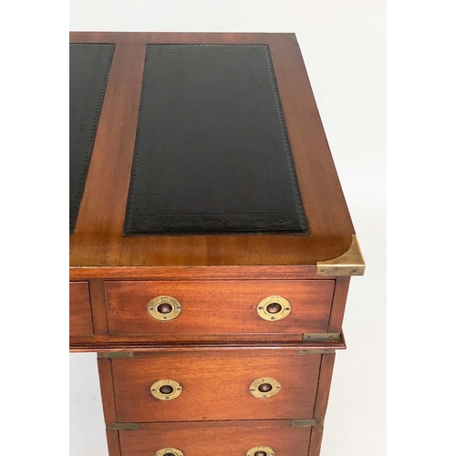 131 - CAMPAIGN STYLE DESK, mahogany and brass bound with leather writing surface and nine drawers, 123cm x... 