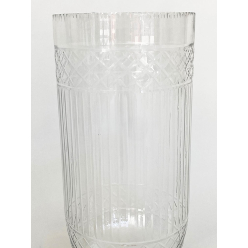 134 - STORM LANTERNS, a pair, cylindrical cut and engraved glass on stepped plinth bases, 40cm H. (2)