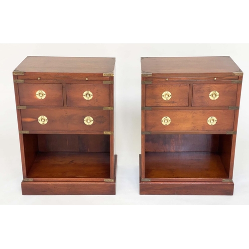 135 - CAMPAIGN STYLE CHESTS, a pair, yewwood and brass bound each with tooled leather brushing slide and t... 