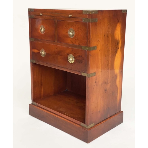 135 - CAMPAIGN STYLE CHESTS, a pair, yewwood and brass bound each with tooled leather brushing slide and t... 