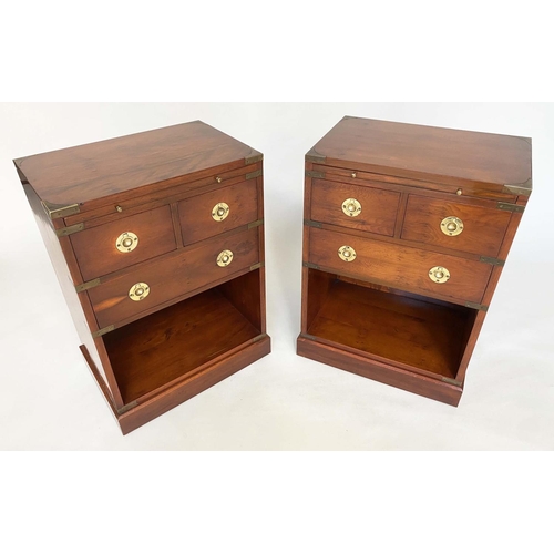 135 - CAMPAIGN STYLE CHESTS, a pair, yewwood and brass bound each with tooled leather brushing slide and t... 