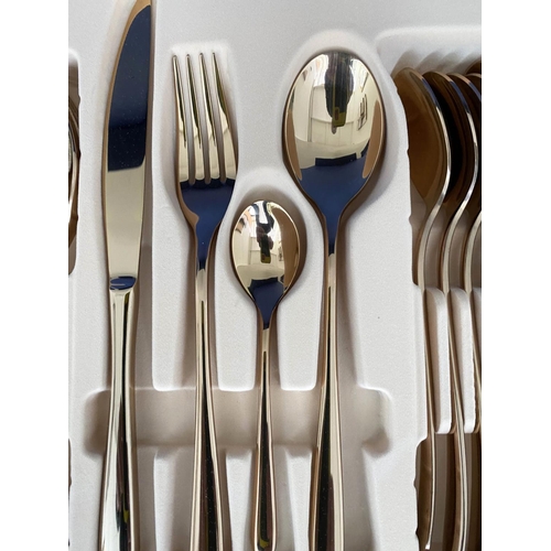 342 - CUTLERY CANTEENS, a pair, each with each setting for four, polished metal, 23cm x 23cm.