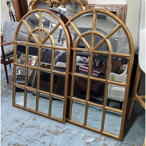 402 - ARCHITECTURAL WALL MIRRORS, a pair, each 85cm W x 127cm H, gilt, with arched tops and bevelled plate... 