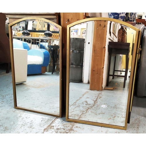 405 - WALL MIRRORS, a pair, aged gilt metal frames with arched tops, 60cm x 91cm. (2)