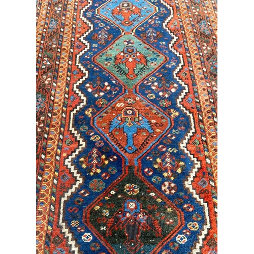 82 - ANTIQUE QASHQAI RUNNER, 390cm x 110cm.