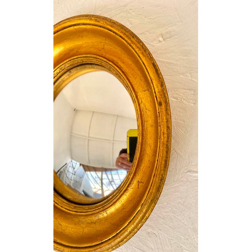 344 - CONVEX WALL MIRRORS, a set of twelve, Regency style, various shapes and sizes, gilt frames, largest ... 