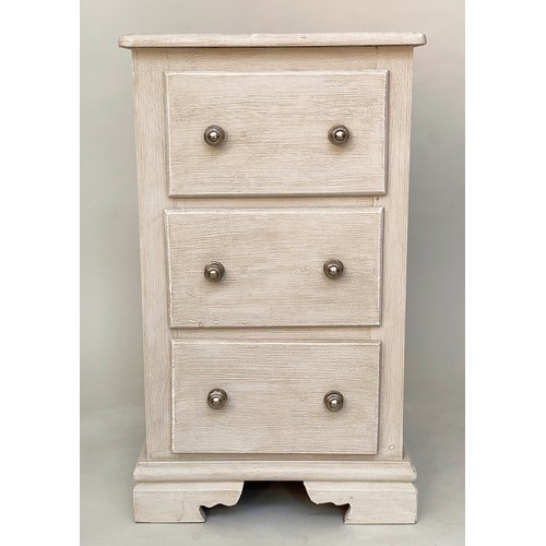 117 - BEDSIDE CHESTS, a pair, traditionally grey painted each with three drawers and bracket supports, 46c... 