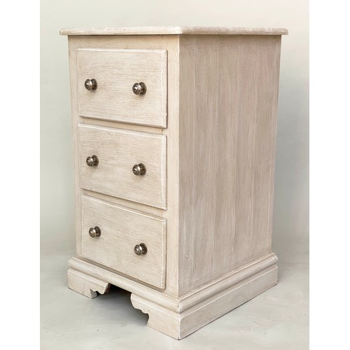 117 - BEDSIDE CHESTS, a pair, traditionally grey painted each with three drawers and bracket supports, 46c... 