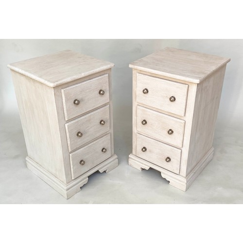 117 - BEDSIDE CHESTS, a pair, traditionally grey painted each with three drawers and bracket supports, 46c... 