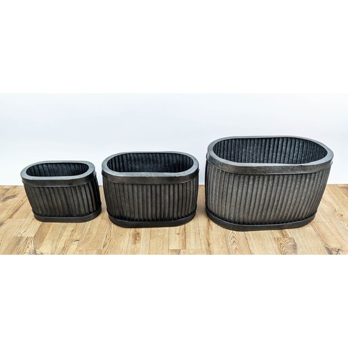 410 - PLANTERS, a graduated set of three, galvanised metal, 57cm x 33cm x 36cm. (3)