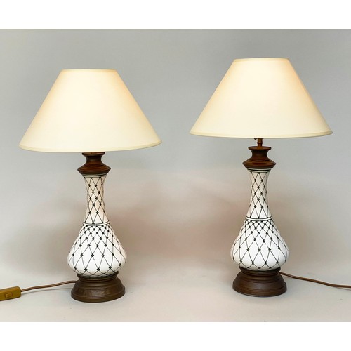 140 - TABLE LAMPS, a pair, 65cm H, baluster form vase shaped and trellis decorated with gilt metal mounts ... 