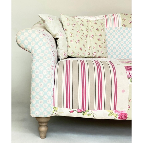 116 - SOFA BY CATH KIDSTON, two seater Victorian style patchwork with scroll arms and turned supports (wit... 