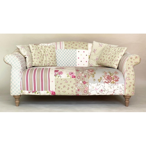 116 - SOFA BY CATH KIDSTON, two seater Victorian style patchwork with scroll arms and turned supports (wit... 