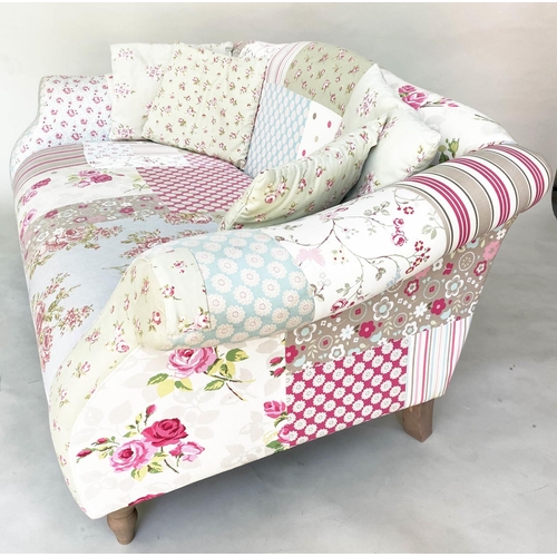 116 - SOFA BY CATH KIDSTON, two seater Victorian style patchwork with scroll arms and turned supports (wit... 