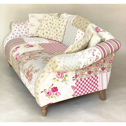 116 - SOFA BY CATH KIDSTON, two seater Victorian style patchwork with scroll arms and turned supports (wit... 