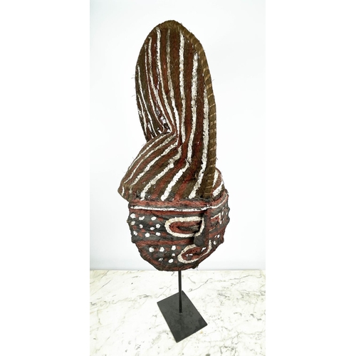 13 - A ZAMBIAN MAKISHI CEREMONIAL MASK, made from wicker and bark cloth with black bees wax and natural d... 