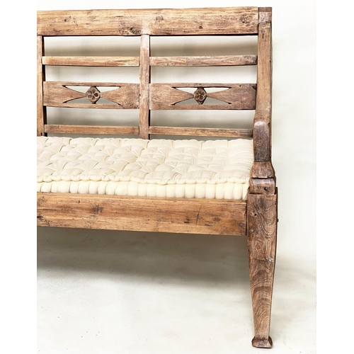 133 - BENCH, antique Anglo Colonial style teak with lattice back, down swept arms and later buttoned cushi... 