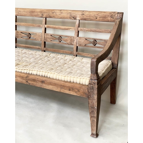 133 - BENCH, antique Anglo Colonial style teak with lattice back, down swept arms and later buttoned cushi... 