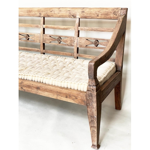 133 - BENCH, antique Anglo Colonial style teak with lattice back, down swept arms and later buttoned cushi... 