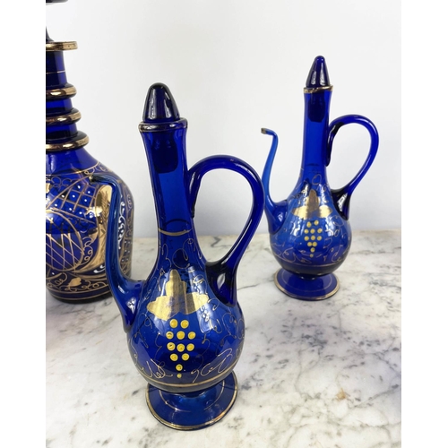 3 - BOHEMIAN DECANTERS, a pair, blue glass with gilt decoration and stoppers, two shaped lipped vases wi... 