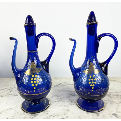 3 - BOHEMIAN DECANTERS, a pair, blue glass with gilt decoration and stoppers, two shaped lipped vases wi... 