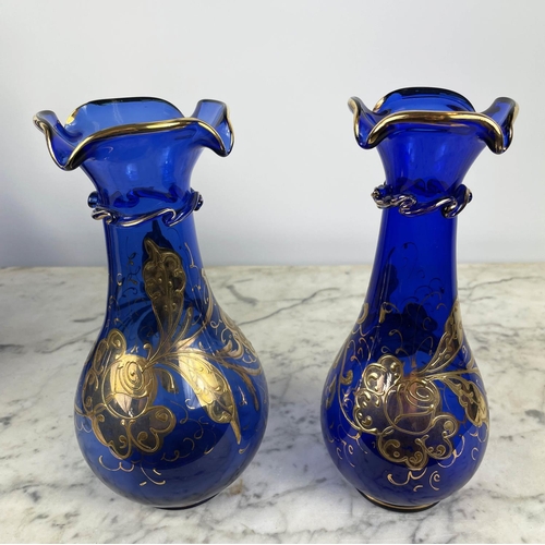 3 - BOHEMIAN DECANTERS, a pair, blue glass with gilt decoration and stoppers, two shaped lipped vases wi... 