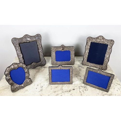 4 - COLLECTION OF SILVER PICTURE FRAMES, six embossed including an RBB makers mark frame, London 1986, a... 