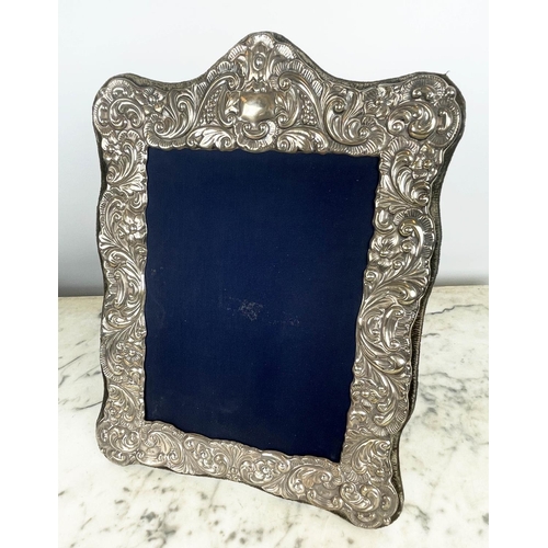 4 - COLLECTION OF SILVER PICTURE FRAMES, six embossed including an RBB makers mark frame, London 1986, a... 