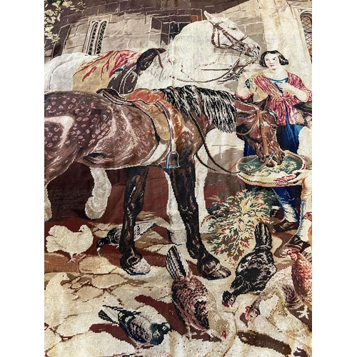 27 - WOOLWORK TAPESTRY, depicting a stable scene, 243cm x 210cm.