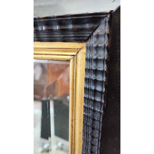 460 - WALL MIRROR, 115cm x 140cm, black frame with gilt detail beveled plate.