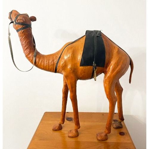 373 - CAMEL, 60cm H, vintage leather figure of a saddled camel.