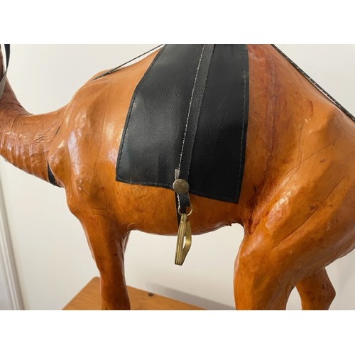 373 - CAMEL, 60cm H, vintage leather figure of a saddled camel.