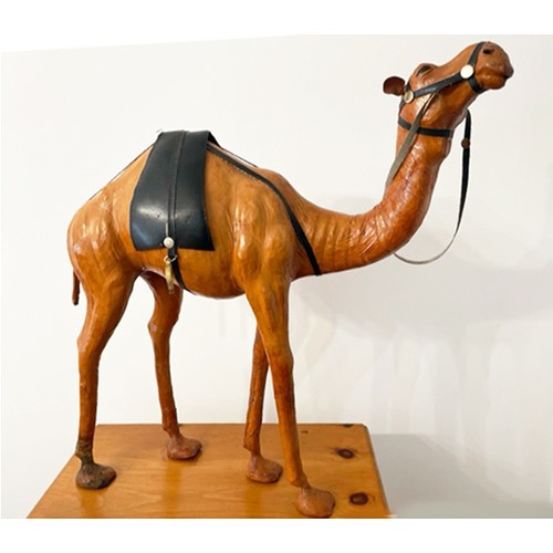 373 - CAMEL, 60cm H, vintage leather figure of a saddled camel.