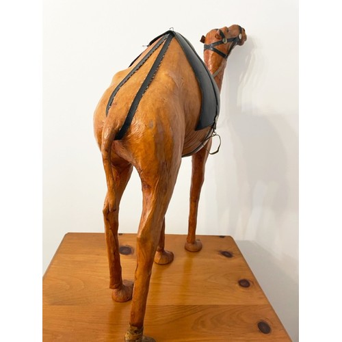 373 - CAMEL, 60cm H, vintage leather figure of a saddled camel.