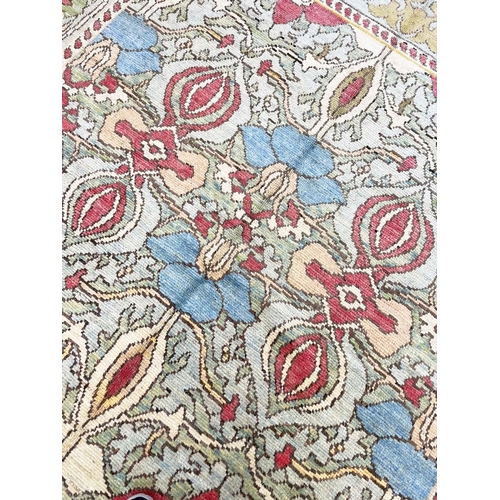 131 - FINE C.F.A VOYSEY DESIGN CARPET, 385cm x 260cm.