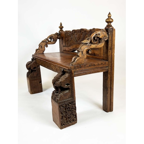 162 - RAJASTHANI BENCH, antique Indian hardwood, profusely carved with elephant head detail arms, 100cm H ... 