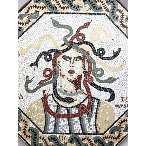 165 - MEDUSA HEAD MOSAIC PANEL, after the antique, with entwined snake design border and Roman numerals fo... 