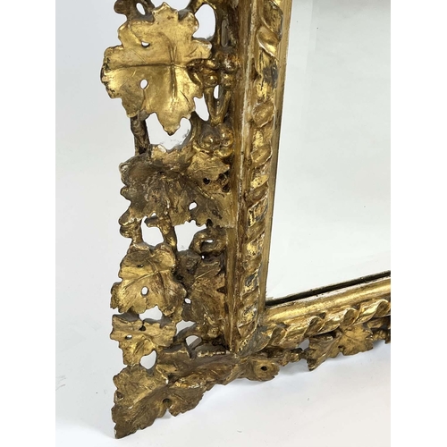 168 - WALL MIRROR, 19th century Florentine giltwood vine leaf design frame with a rectangular bevelled pla... 