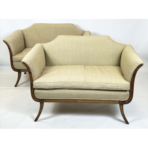 172 - SETTEES, 86cm H x 127cm W, a pair, 20th century, with squab seat cushions in taupe linen on sabre le... 