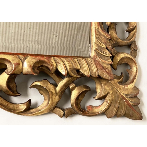 188 - FLORENTINE WALL MIRROR, Italian carved giltwood, pierced foliate frame and bevelled mirror plate, 13... 