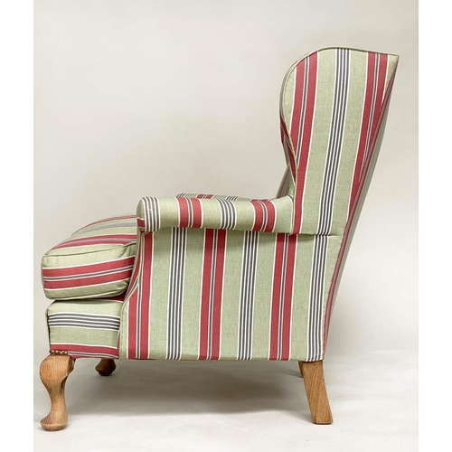 198 - WINGBACK ARMCHAIR, early 20th century with ticking style upholstery, 82cm W.