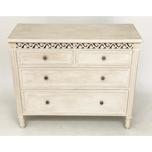 215 - COMMODE, French style traditionally grey painted with pierced frieze and four drawers, 75cm H x 89cm... 