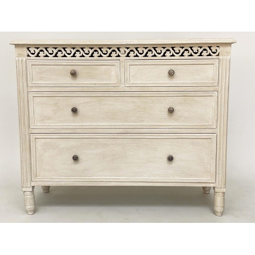 215 - COMMODE, French style traditionally grey painted with pierced frieze and four drawers, 75cm H x 89cm... 